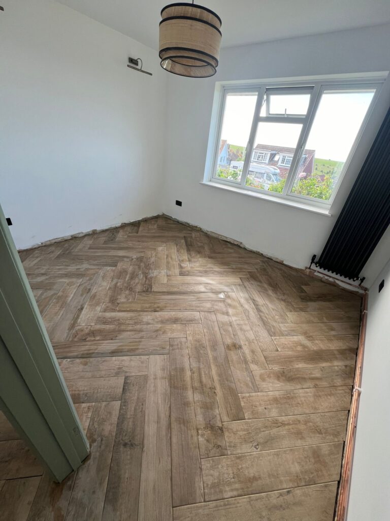 WhatsApp Image 2024-05-31 at 13.06.28 Herringbone Wood Effect Tiles